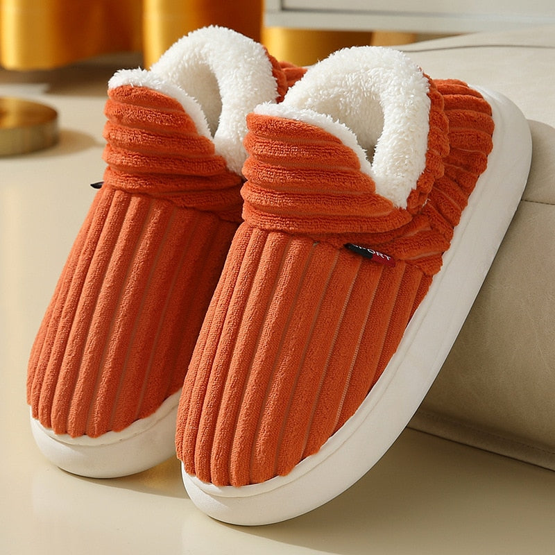 Chaussons montants fourrés en mouton pour femme avec une semelle en PVC, de couleur orange